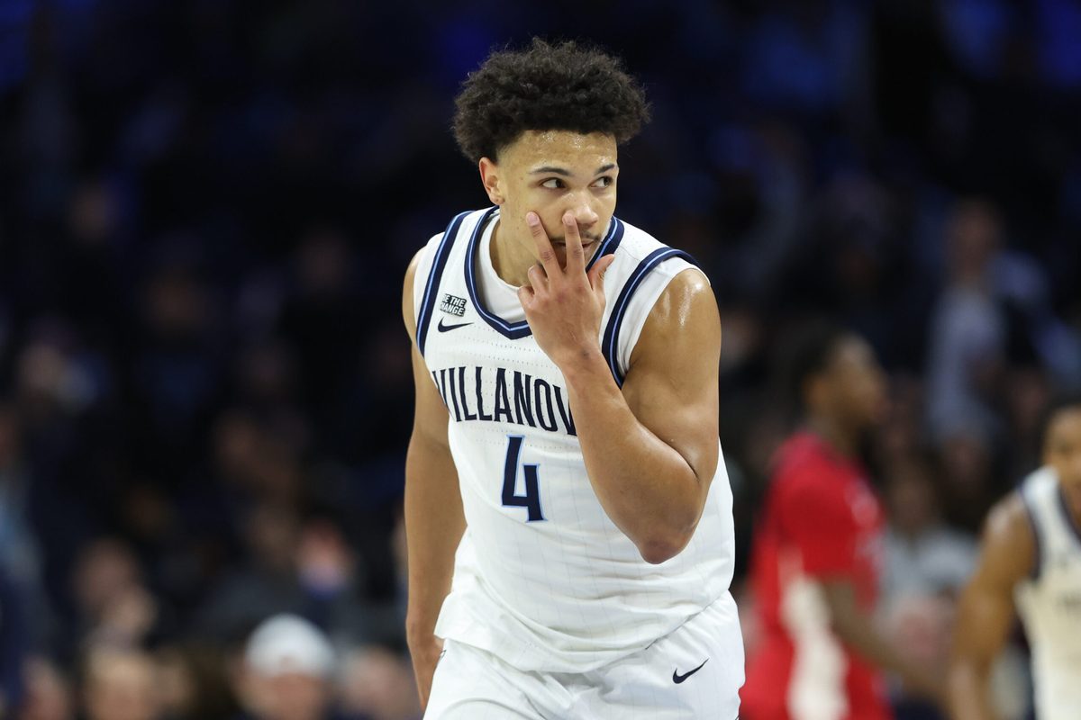 Jan 17, 2026; Philadelphia, Pennsylvania, USA; Villanova Wildcats guard Tyler Perkins (4) reacts to his three pointer against the St. John's Red Storm during the second half at Xfinity Mobile Arena. Mandatory Credit: Bill Streicher-Imagn Images