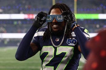 Jan 17, 2026; Seattle, WA, USA;  Seattle Seahawks cornerback Riq Woolen (27) celebrates following an NFC Divisional Round game against the San Francisco 49ers at Lumen Field. Mandatory Credit: Kevin Ng-Imagn Images