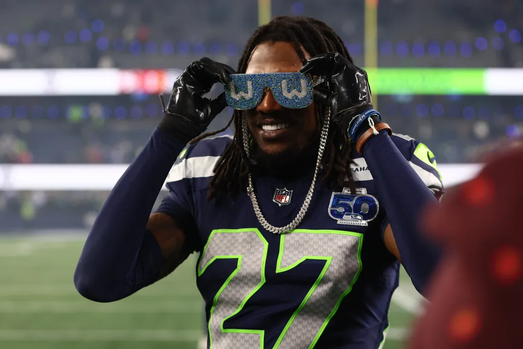 Jan 17, 2026; Seattle, WA, USA; Seattle Seahawks cornerback Riq Woolen (27) celebrates following an NFC Divisional Round game against the San Francisco 49ers at Lumen Field. Mandatory Credit: Kevin Ng-Imagn Images