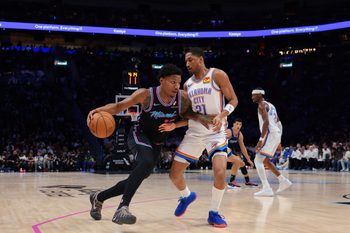 Jan 17, 2026; Miami, Florida, USA; Miami Heat forward Myron Gardner (15) drives to the basket against Oklahoma City Thunder guard Aaron Wiggins (21) during the third quarter during the third quarter at Kaseya Center. Mandatory Credit: Sam Navarro-Imagn Images