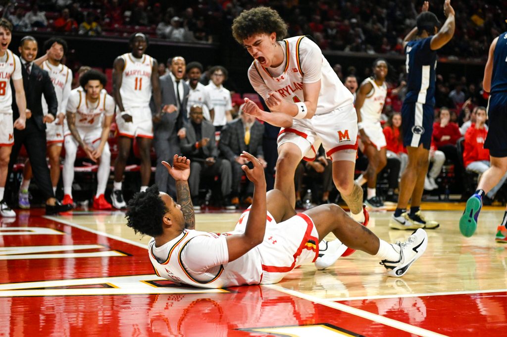 Jan 18, 2026; College Park, Maryland, USA; Maryland Terrapins guard Darius Adams (1) celebrates with guard David Coit (8) during the second half against the Penn State Nittany Lions at Xfinity Center. Mandatory Credit: Tommy Gilligan-Imagn Images