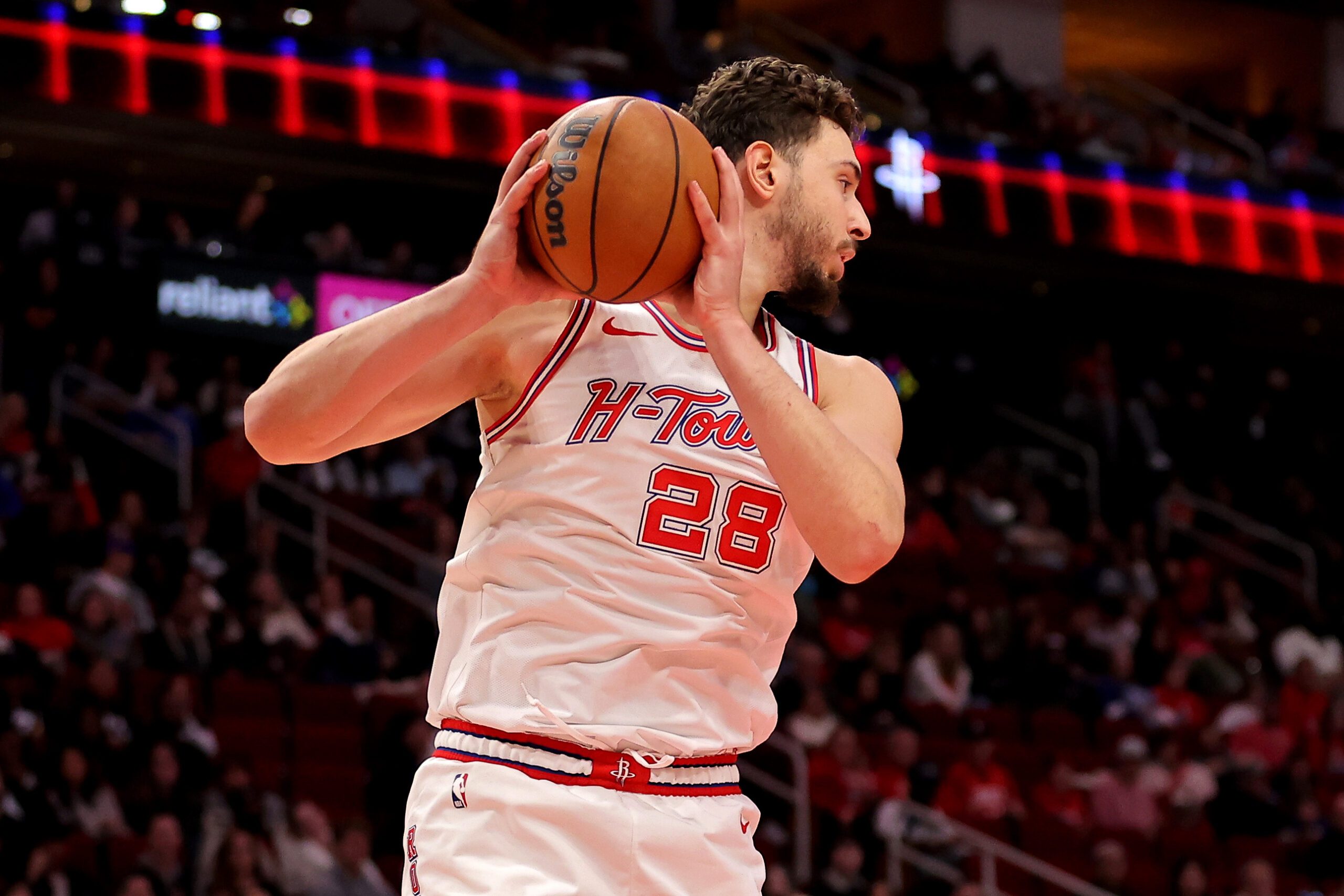 Jan 18, 2026; Houston, Texas, USA; Houston Rockets center Alperen Sengun (28) rebounds against the New Orleans Pelicans during the fourth quarter at Toyota Center. Mandatory Credit: Erik Williams-Imagn Images