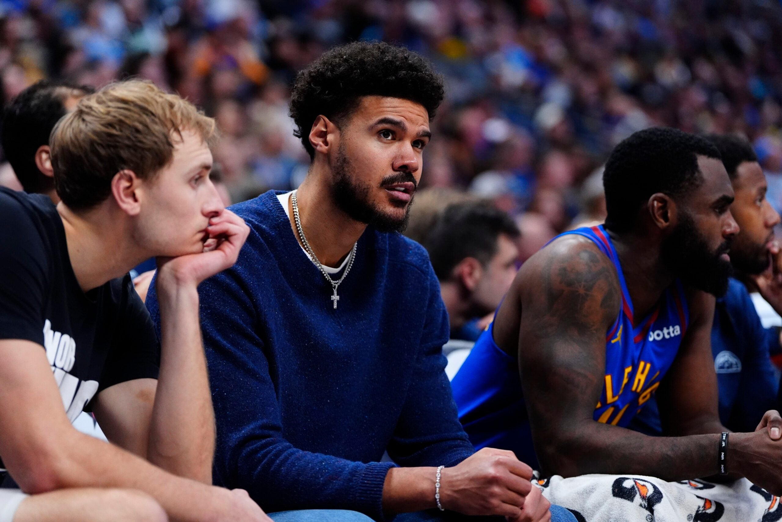 Jan 18, 2026; Denver, Colorado, USA; Denver Nuggets forward Cameron Johnson (23) on the bench in the second quarter against the Charlotte Hornets at Ball Arena. Mandatory Credit: Ron Chenoy-Imagn Images