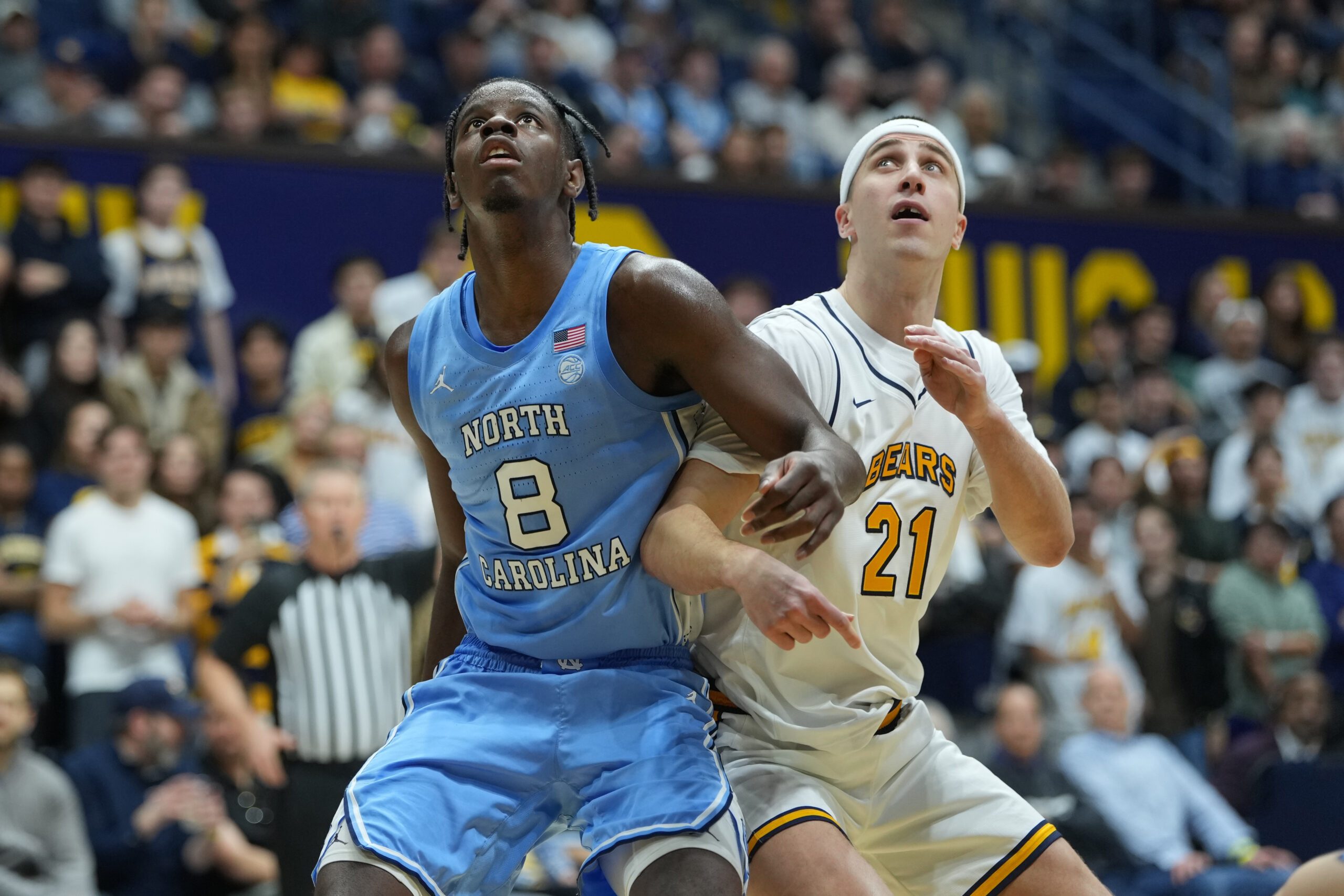 Jan 17, 2026; Berkeley, California, USA; North Carolina Tar Heels forward Caleb Wilson (8) blocks out California Golden Bears guard Nolan Dorsey (21) during the second half at Haas Pavilion. Mandatory Credit: Darren Yamashita-Imagn Images