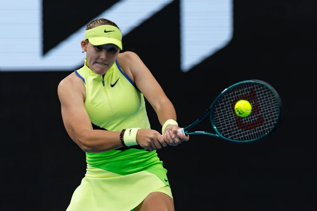 Jan 19, 2026; Melbourne, Victoria, Australia; Mirra Andreeva in action against Donna Vekic of Croatia in the first round of the women’s singles at the Australian Open at Margaret Court Arena in Melbourne Park. Mandatory Credit: Mike Frey-Imagn Images