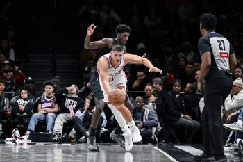 Jan 19, 2026; Brooklyn, New York, USA; Phoenix Suns guard Grayson Allen (8) vies for the ball against Brooklyn Nets guard/forward Drake Powell (4) during the second half at Barclays Center. Mandatory Credit: John Jones-Imagn Images