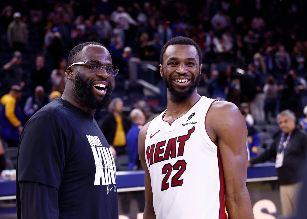 Jan 19, 2026; San Francisco, California, USA; Golden State Warriors forward Draymond Green (23) smiles with Miami Heat forward Andrew Wiggins (22) after the game at Chase Center. Mandatory Credit: Kelley L Cox-Imagn Images