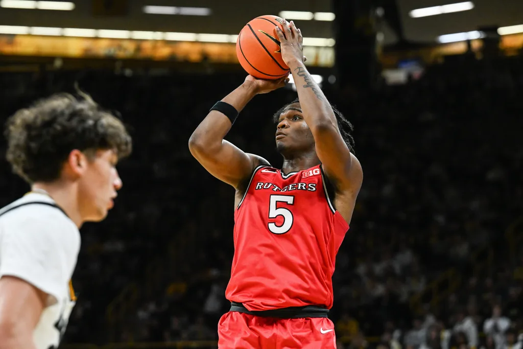 Jan 20, 2026; Iowa City, Iowa, USA; Rutgers Scarlet Knights guard Darren Buchanan Jr. (5) shoots the ball against the Iowa Hawkeyes during the first half at Carver-Hawkeye Arena. Mandatory Credit: Jeffrey Becker-Imagn Images