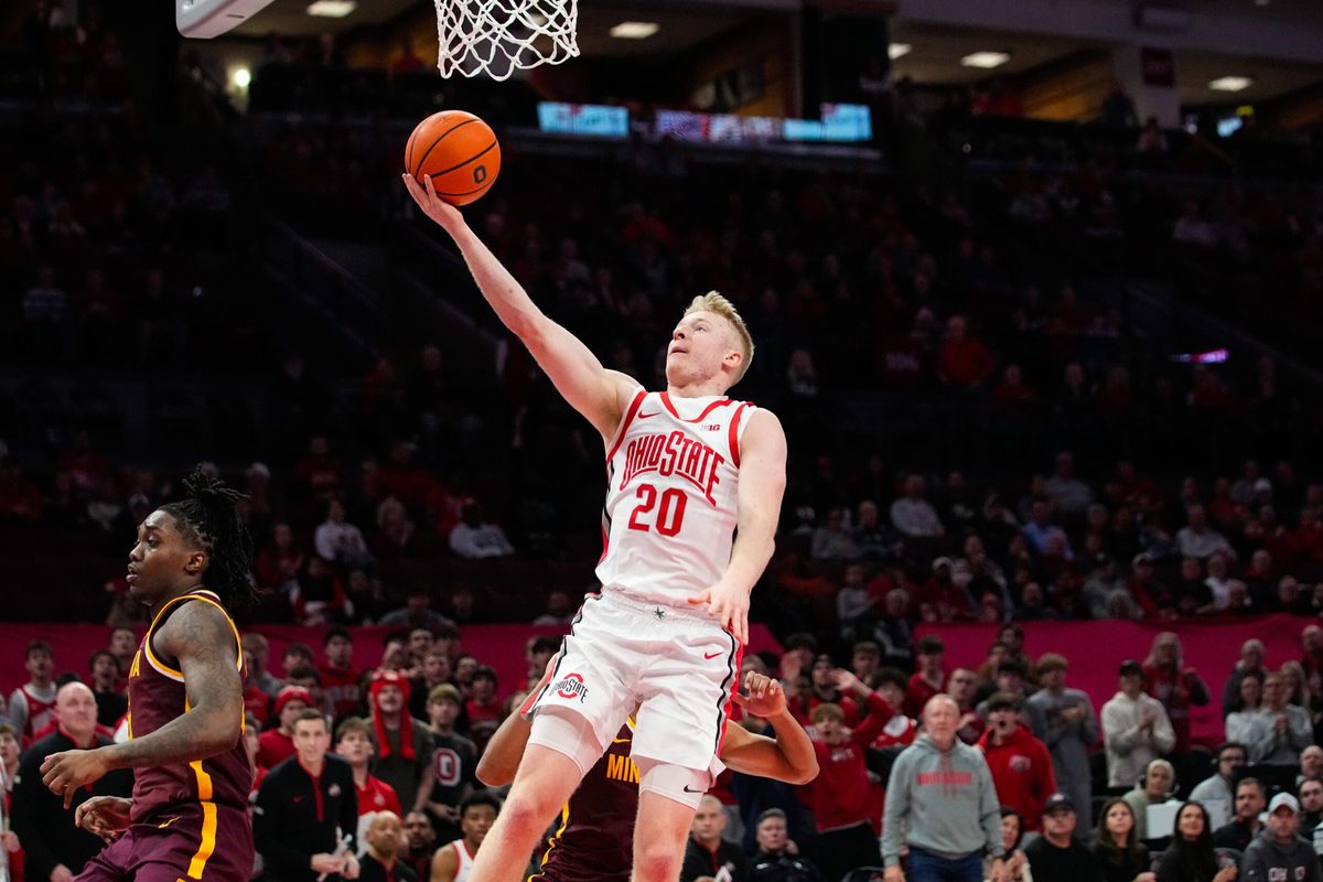 Ohio State Buckeyes forward Colin White (20) shoots a layup in overtime in the NCAA basketball game at Value City Arena on Tuesday, Jan. 20, 2026 in Columbus, Ohio.