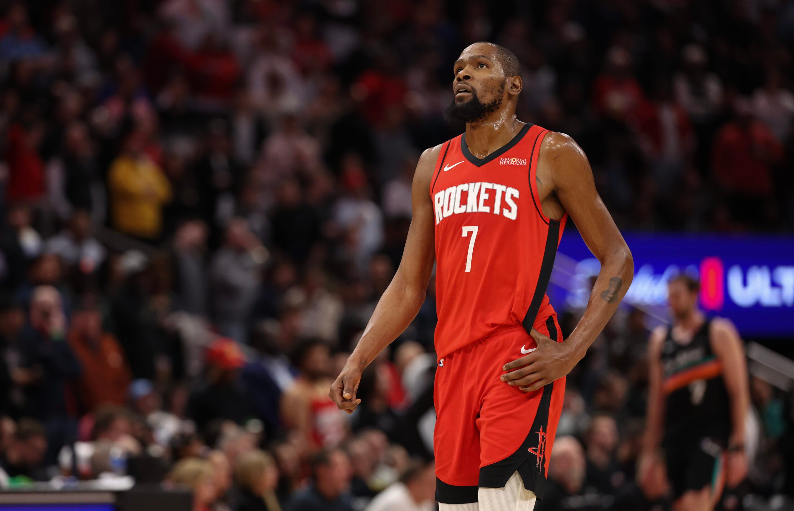 Jan 20, 2026; Houston, Texas, USA; Houston Rockets forward Kevin Durant (7) looks up at the replay board while playing against the San Antonio Spurs timeout  in the second half at Toyota Center. Mandatory Credit: Thomas Shea-Imagn Images