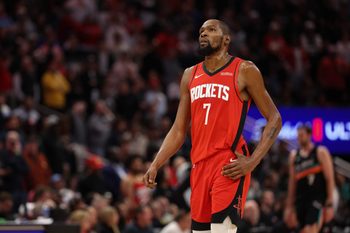 Jan 20, 2026; Houston, Texas, USA; Houston Rockets forward Kevin Durant (7) looks up at the replay board while playing against the San Antonio Spurs timeout  in the second half at Toyota Center. Mandatory Credit: Thomas Shea-Imagn Images