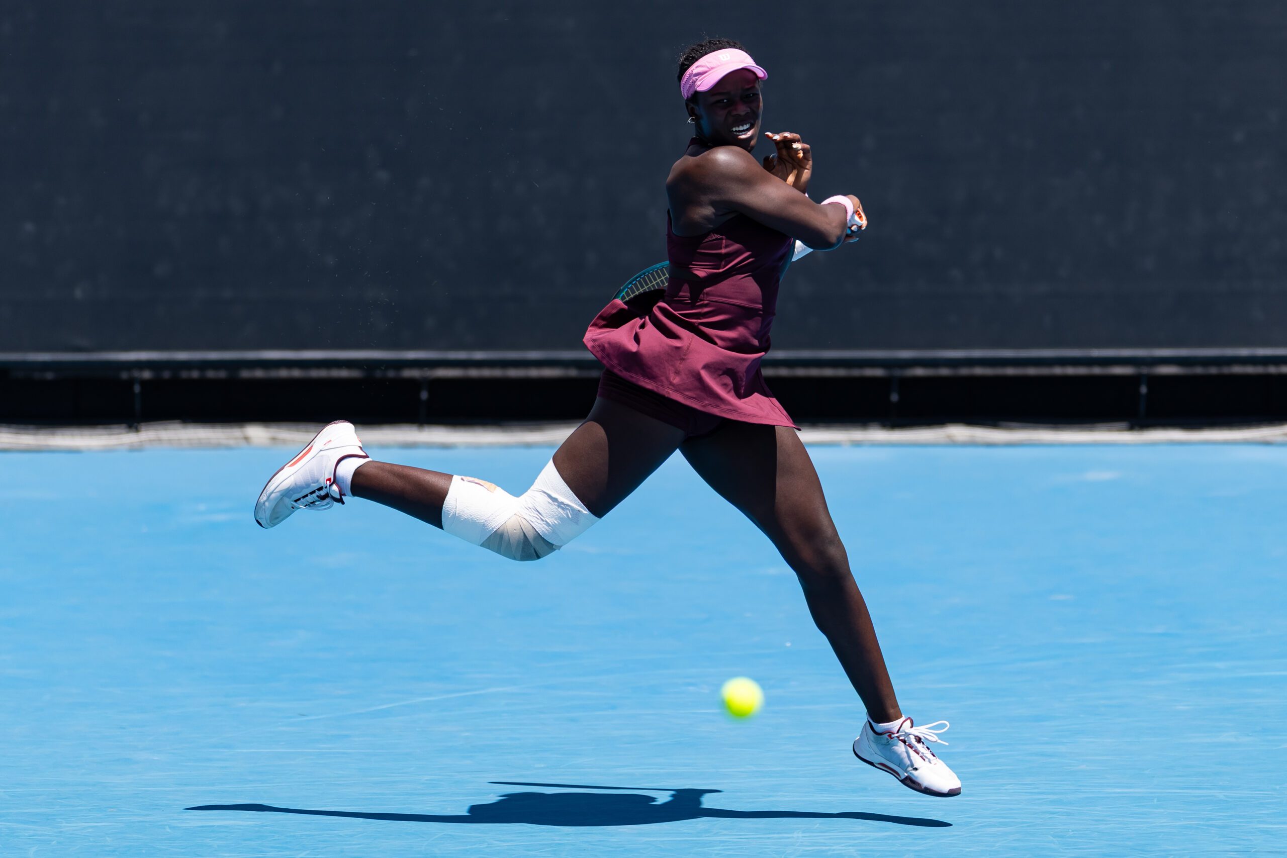 Jan 21, 2026; Melbourne, Victoria, Australia; Victoria Mboko of Canada in action against Caty McNally of United States in the second round of the women’s singles at the Australian Open at 1573 Arena in Melbourne Park. Mandatory Credit: Mike Frey-Imagn Images