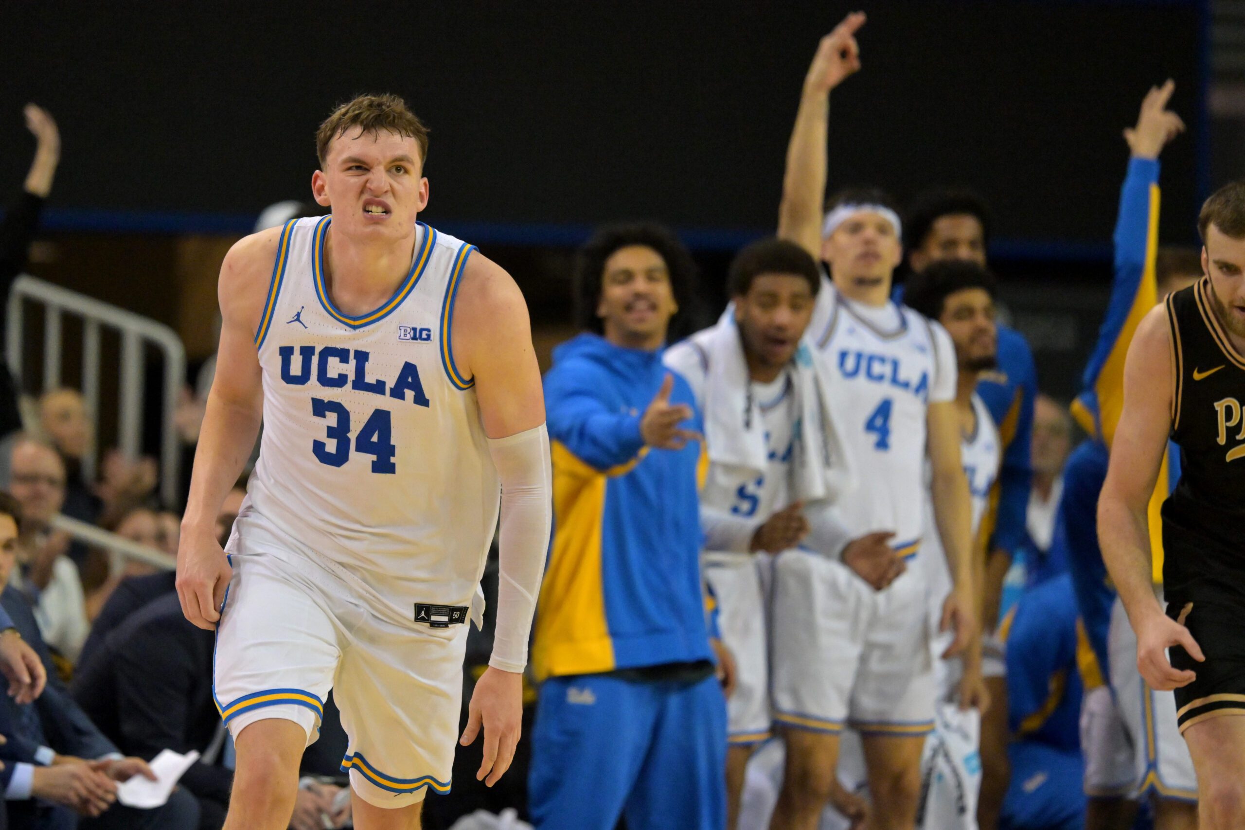 Jan 20, 2026; Los Angeles, California, USA; UCLA Bruins forward Tyler Bilodeau (34) reacts after a 3-point basket in the second half against the Purdue Boilermakers at Pauley Pavilion presented by Wescom Financial. Mandatory Credit: Jayne Kamin-Oncea-Imagn Images