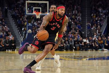 Jan 20, 2026; San Francisco, California, USA;  Toronto Raptors forward Brandon Ingram (3) drives by Golden State Warriors guard De'Anthony Melton (8) in the third quarter at Chase Center. Mandatory Credit: David Gonzales-Imagn Images