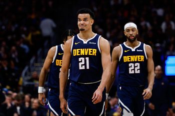Jan 20, 2026; Denver, Colorado, USA; Denver Nuggets forward Spencer Jones (21) reacts after a play in the third quarter against the Los Angeles Lakers at Ball Arena. Mandatory Credit: Isaiah J. Downing-Imagn Images