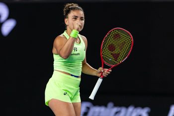 Jan 21, 2026; Melbourne, Victoria, Australia; Jasmine Paolini of Italy in action against Magdalena Frech of Poland in the second round of the womenís singles at the Australian Open at John Cain Arena in Melbourne Park. Mandatory Credit: Mike Frey-Imagn Images