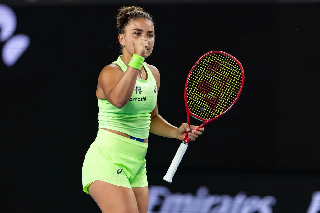 Jan 21, 2026; Melbourne, Victoria, Australia; Jasmine Paolini of Italy in action against Magdalena Frech of Poland in the second round of the womenís singles at the Australian Open at John Cain Arena in Melbourne Park. Mandatory Credit: Mike Frey-Imagn Images