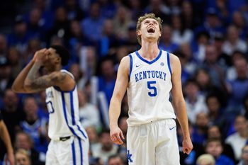 Jan 21, 2026; Lexington, Kentucky, USA; Kentucky Wildcats guard Collin Chandler (5) reacts after guard Otega Oweh is called for his fourth foul during the second half against the Texas Longhorns at Rupp Arena at Central Bank Center. Mandatory Credit: Jordan Prather-Imagn Images