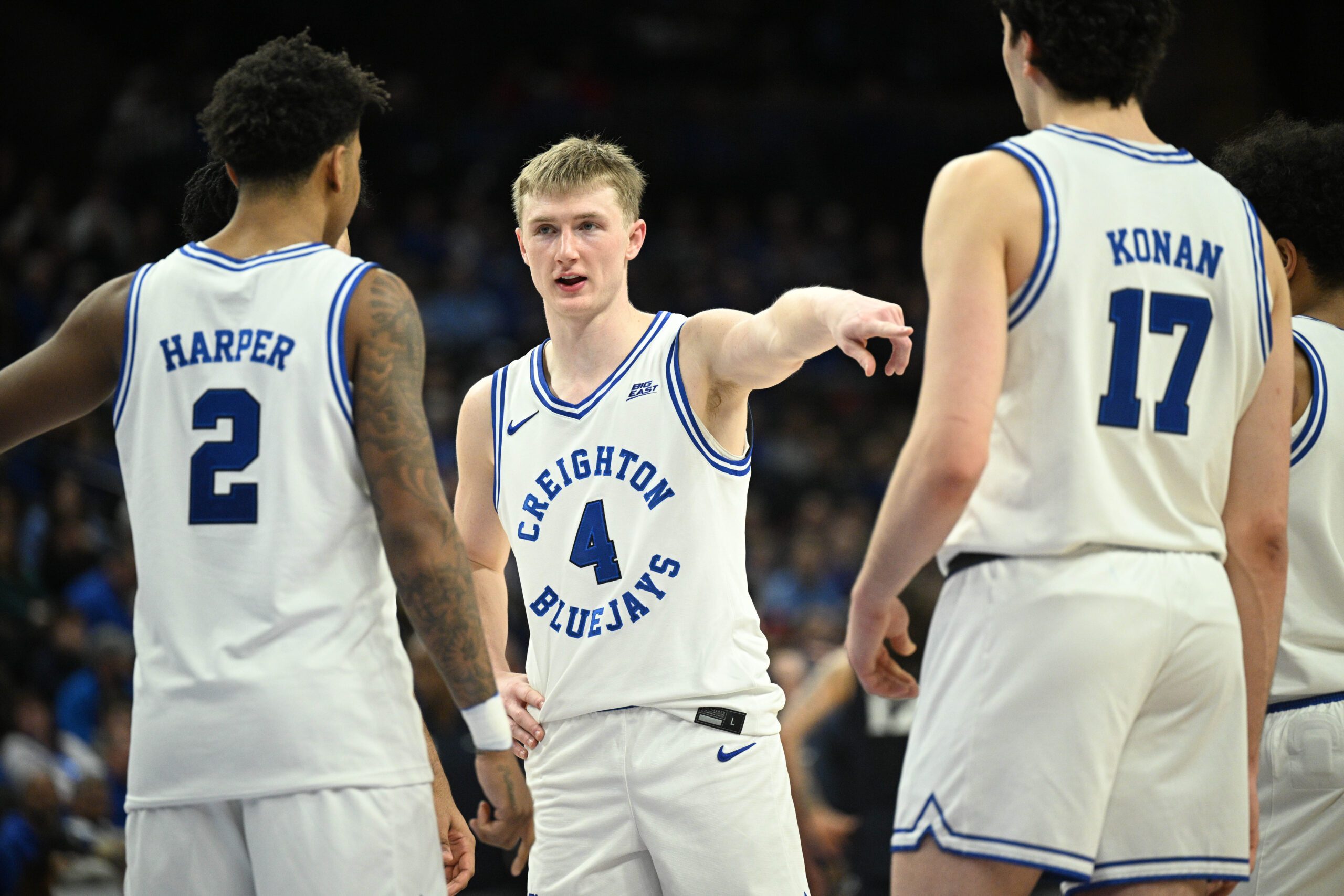 Jan 21, 2026; Omaha, Nebraska, USA;  Creighton Bluejays guard Josh Dix (4) and guard Blake Harper (2) and forward Kerem Konan (17) on the court against the Xavier Musketeers during the second half at CHI Health Center Omaha. Mandatory Credit: Steven Branscombe-Imagn Images