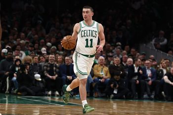 Jan 21, 2026; Boston, Massachusetts, USA; Boston Celtics guard Payton Pritchard (11) brings the ball up the court against the Indiana Pacers during the second quarter at TD Garden. Mandatory Credit: Winslow Townson-Imagn Images
