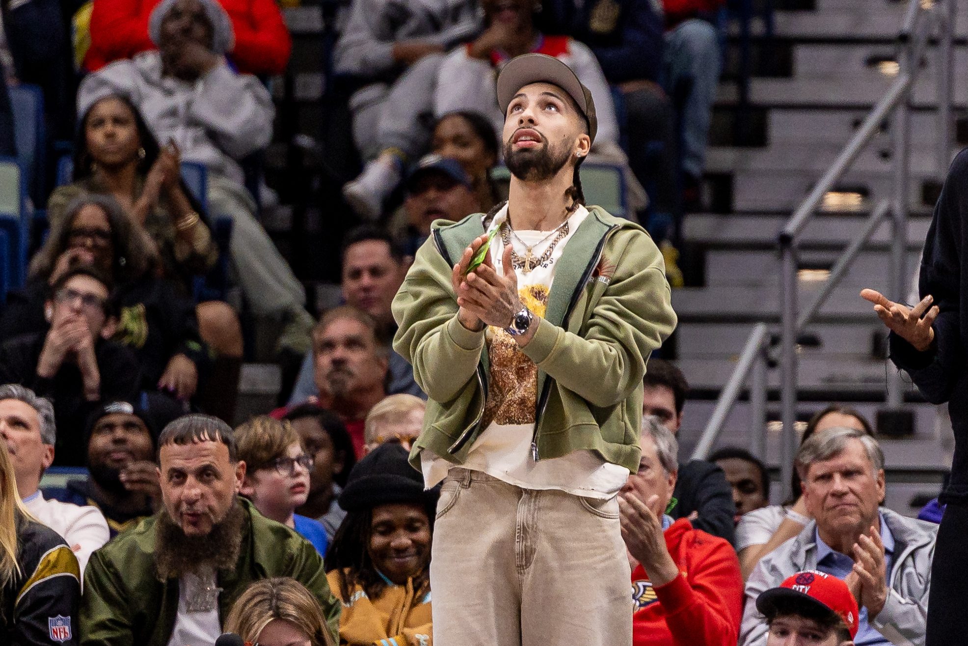 Jan 21, 2026; New Orleans, Louisiana, USA;  New Orleans Pelicans guard Jose Alvarado (15) reacts to a play from the sidelines against the Detroit Pistons during the second half at Smoothie King Center. Mandatory Credit: Stephen Lew-Imagn Images