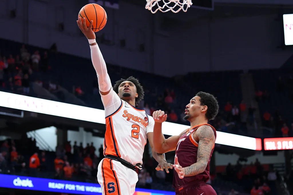 Jan 21, 2026; Syracuse, New York, USA; Syracuse Orange guard J.J. Starling (2) shoots against Virginia Tech Hokies guard Jailen Bedford (0) during the second half at the JMA Wireless Dome. Mandatory Credit: Rich Barnes-Imagn Images