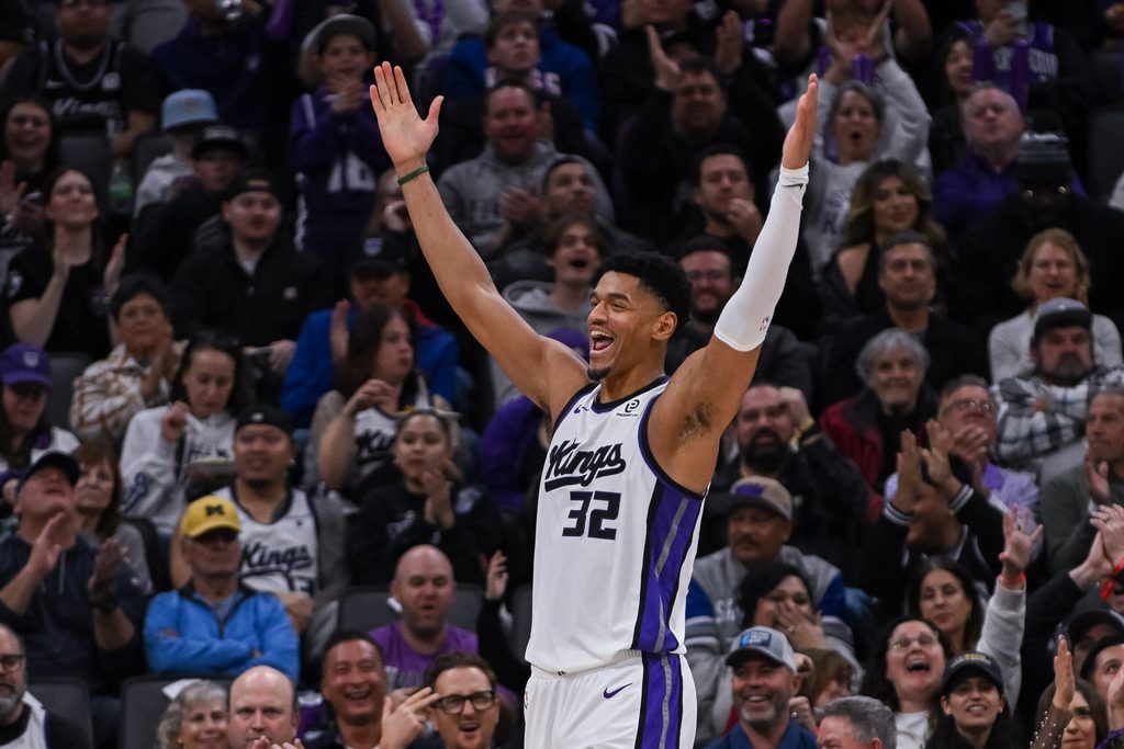 Jan 21, 2026; Sacramento, California, USA; Sacramento Kings center Dylan Cardwell (32) celebrates after drawing a foul against the Toronto Raptors during the third quarter at Golden 1 Center. Mandatory Credit: Ed Szczepanski-Imagn Images