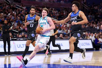Jan 22, 2026; Orlando, Florida, USA; Charlotte Hornets guard Kon Knueppel (7) drives to the basket against the Orlando Magic in the fourth quarter  at Kia Center. Mandatory Credit: Nathan Ray Seebeck-Imagn Images