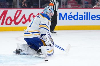 Jan 22, 2026; Montreal, Quebec, CAN; Buffalo Sabres goalie Ukko-Pekka Luukkonen (1) makes a pad save during the third period against the Montreal Canadiens at the Bell Centre. Mandatory Credit: Eric Bolte-Imagn Images