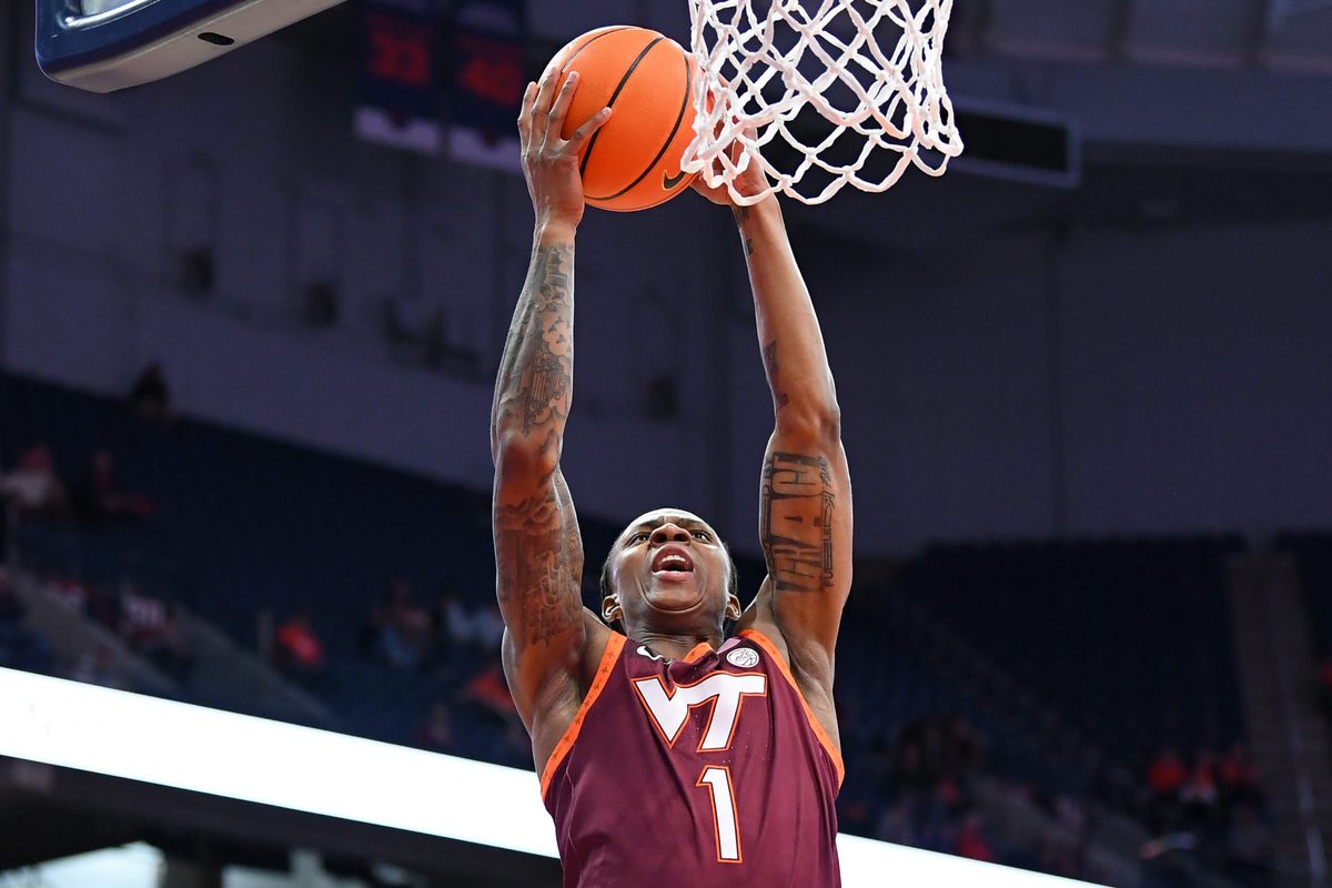 Jan 21, 2026; Syracuse, New York, USA; Virginia Tech Hokies forward Tobi Lawal (1) shoots against the Syracuse Orange during the first half at the JMA Wireless Dome. Mandatory Credit: Rich Barnes-Imagn Images