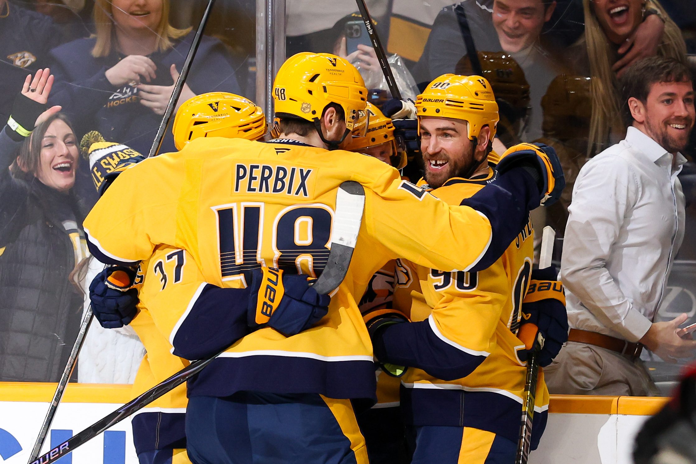 Jan 22, 2026; Nashville, Tennessee, USA;  Nashville Predators center Steven Stamkos (91) celebrates with his teammates after scoring a goal after his hat trick goal against the Ottawa Senators during the third period at Bridgestone Arena. Mandatory Credit: Steve Roberts-Imagn Images