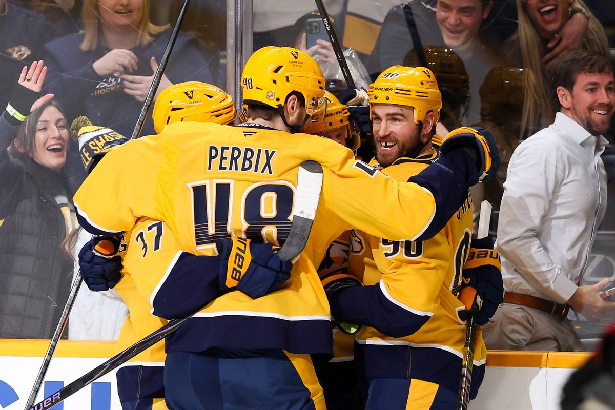 Jan 22, 2026; Nashville, Tennessee, USA; Nashville Predators center Steven Stamkos (91) celebrates with his teammates after scoring a goal after his hat trick goal against the Ottawa Senators during the third period at Bridgestone Arena. Mandatory Credit: Steve Roberts-Imagn Images