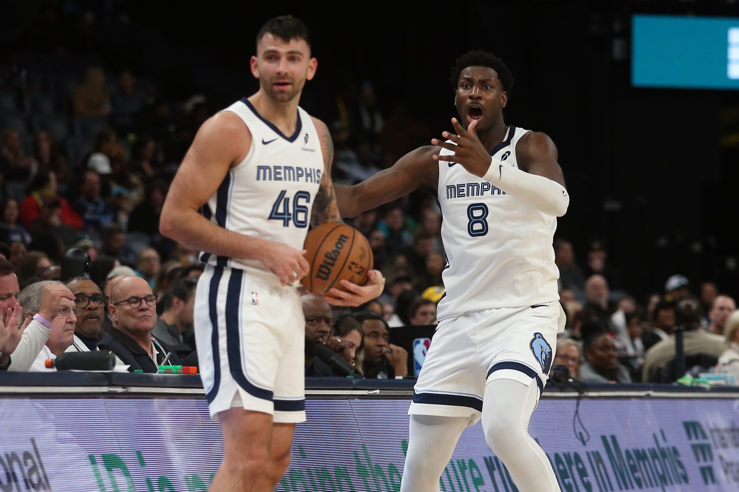 Jan 23, 2026; Memphis, Tennessee, USA; Memphis Grizzlies John Konchar (46) and forward/center Jaren Jackson Jr. (8) react after an out of bounds call during the fourth quarter against the New Orleans Pelicans at FedExForum. Mandatory Credit: Petre Thomas-Imagn Images