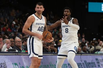 Jan 23, 2026; Memphis, Tennessee, USA; Memphis Grizzlies John Konchar (46) and forward/center Jaren Jackson Jr. (8) react after an out of bounds call during the fourth quarter against the New Orleans Pelicans at FedExForum. Mandatory Credit: Petre Thomas-Imagn Images