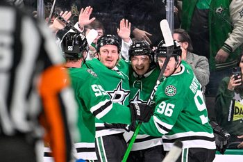 Jan 23, 2026; Dallas, Texas, USA; Dallas Stars center Roope Hintz (24) and left wing Jason Robertson (21) and right wing Mikko Rantanen (96) and defenseman Thomas Harley (55) celebrate the game winning goal scored by Robertson against the St. Louis Blues during the third period at the American Airlines Center. Mandatory Credit: Jerome Miron-Imagn Images