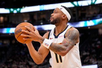 Jan 23, 2026; Milwaukee, Wisconsin, USA;  Denver Nuggets guard Bruce Brown (11) shoots during the fourth quarter against the Milwaukee Bucks at Fiserv Forum. Mandatory Credit: Jeff Hanisch-Imagn Images