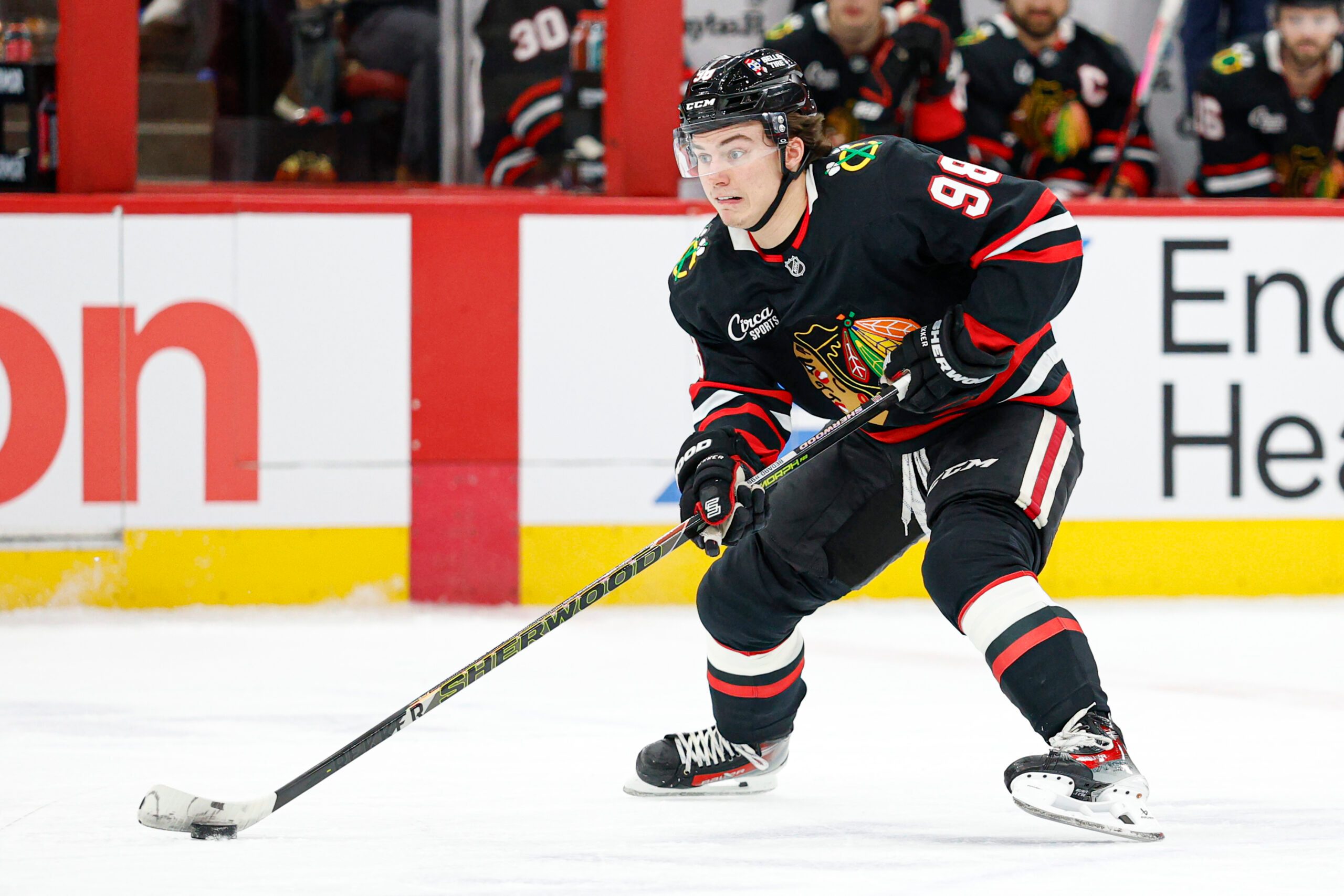 Jan 23, 2026; Chicago, Illinois, USA; Chicago Blackhawks center Connor Bedard (98) looks to pass the puck against the Tampa Bay Lightning during the first period at United Center. Mandatory Credit: Kamil Krzaczynski-Imagn Images