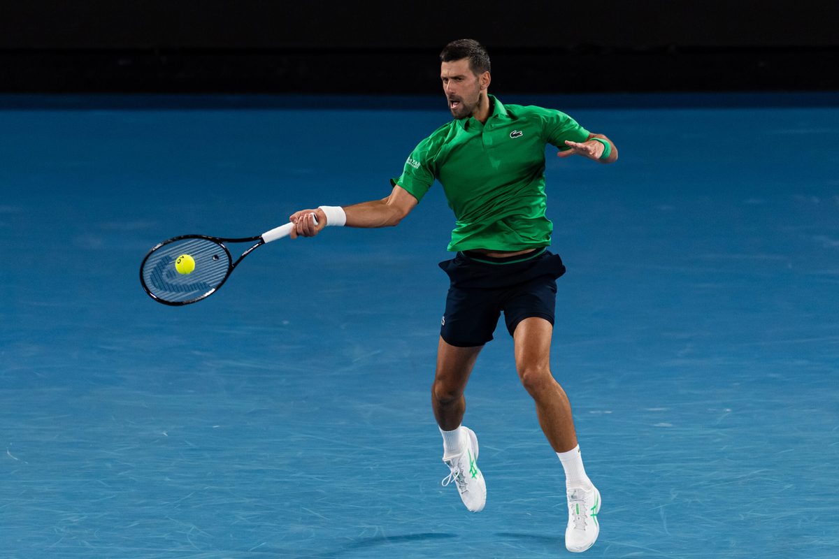 Jan 24, 2026; Melbourne, Victoria, Australia; Novak Djokovic of Serbia in action against Botic van de Zandschulp of Netherlands in the third round of the menís singles at the Australian Open at Rod Laver Arena in Melbourne Park. Mandatory Credit: Mike Frey-Imagn Images