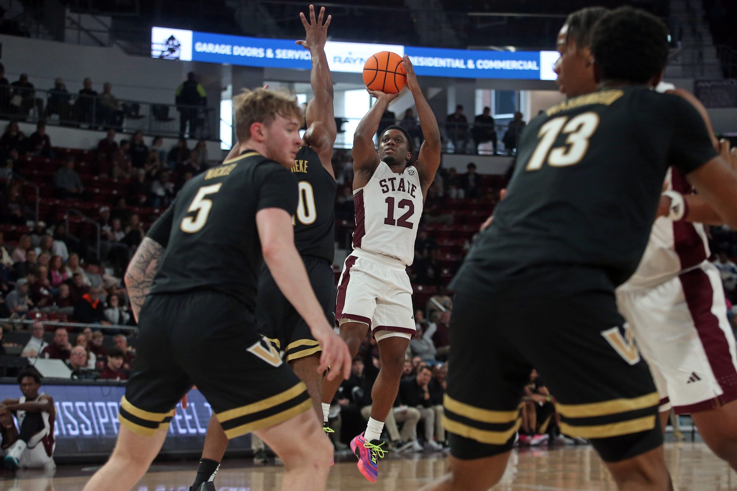 Jan 24, 2026; Starkville, Mississippi, USA; Mississippi State Bulldogs guard Josh Hubbard (12) shoots during the second half against the Vanderbilt Commodores at Humphrey Coliseum. Mandatory Credit: Petre Thomas-Imagn Images