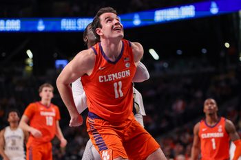 Jan 24, 2026; Atlanta, Georgia, USA; Clemson Tigers forward Nick Davidson (11) boxes out against the Georgia Tech Yellow Jackets in the second half at McCamish Pavilion. Mandatory Credit: Brett Davis-Imagn Images