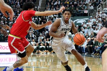 Jan 24, 2026; East Lansing, Michigan, USA;  Michigan State Spartans guard Jeremy Fears Jr. (1) drives past Maryland Terrapins guard Isaiah Watts (12) during the second half at Jack Breslin Student Events Center. Mandatory Credit: Dale Young-Imagn Images