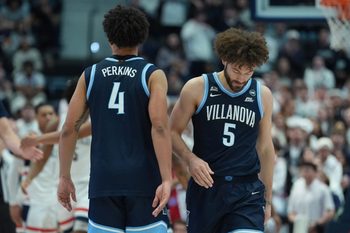 Jan 24, 2026; Storrs, Connecticut, USA; Villanova Wildcats guard Devin Askew (5) and guard Devin Askew (5) return up court against the UConn Huskies in the second half at Harry A. Gampel Pavilion. Mandatory Credit: David Butler II-Imagn Images