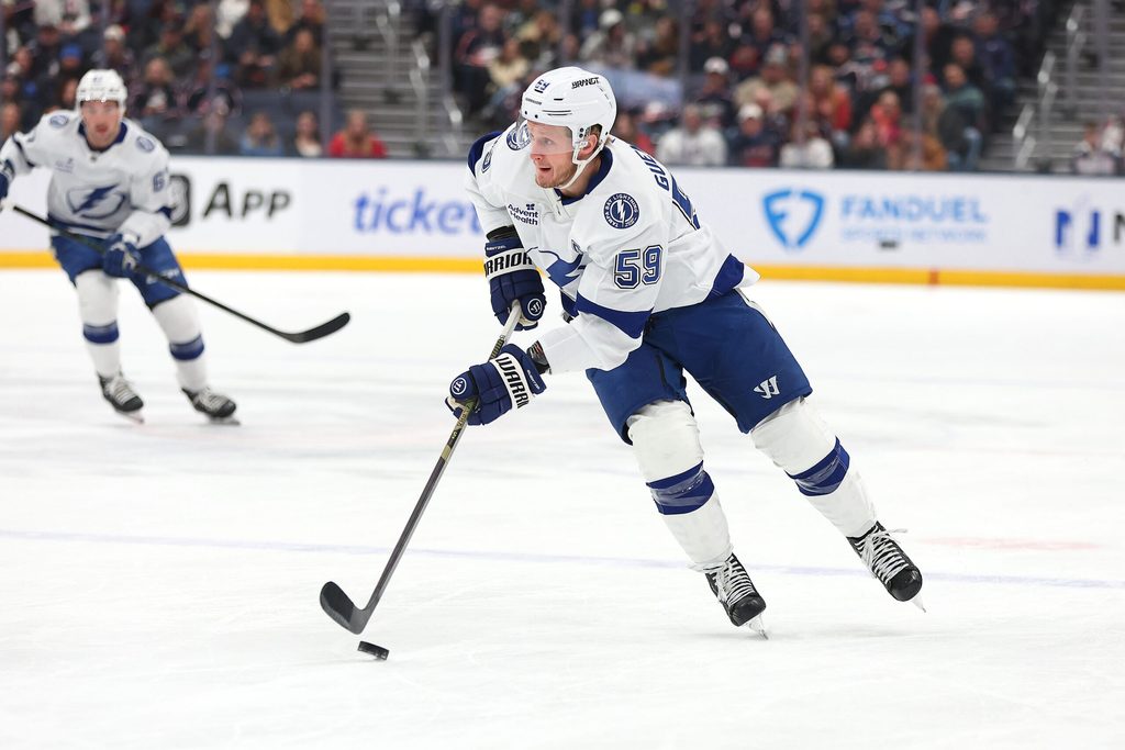 Jan 24, 2026; Columbus, Ohio, USA; Tampa Bay Lightning center Jake Guentzel (59) looks to pass the puck during the first period against the Columbus Blue Jackets at Nationwide Arena. Mandatory Credit: Joseph Maiorana-Imagn Images