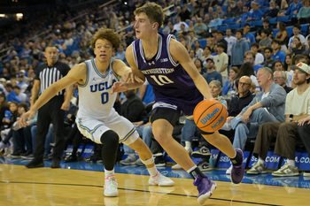 Jan 24, 2026; Los Angeles, California, USA;  Northwestern Wildcats guard Max Green (10) is defended by UCLA Bruins guard Trent Perry (0) as he drives to the basket in the second half at Pauley Pavilion presented by Wescom Financial. Mandatory Credit: Jayne Kamin-Oncea-Imagn Images
