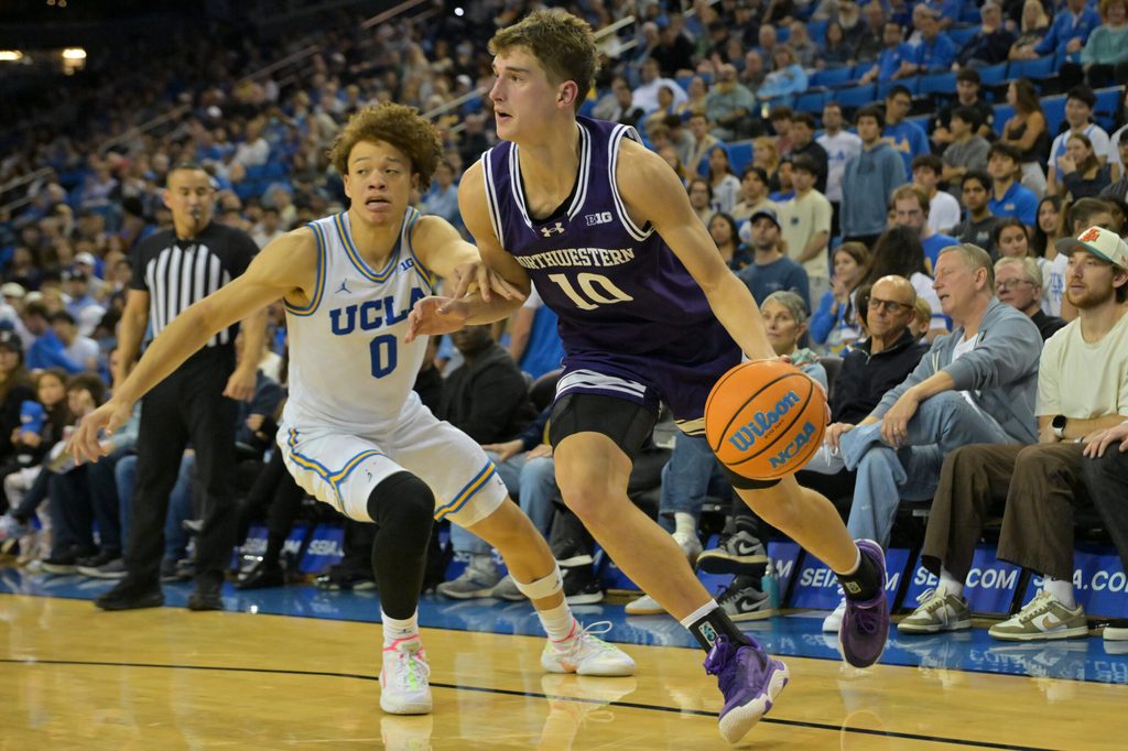 Jan 24, 2026; Los Angeles, California, USA; Northwestern Wildcats guard Max Green (10) is defended by UCLA Bruins guard Trent Perry (0) as he drives to the basket in the second half at Pauley Pavilion presented by Wescom Financial. Mandatory Credit: Jayne Kamin-Oncea-Imagn Images