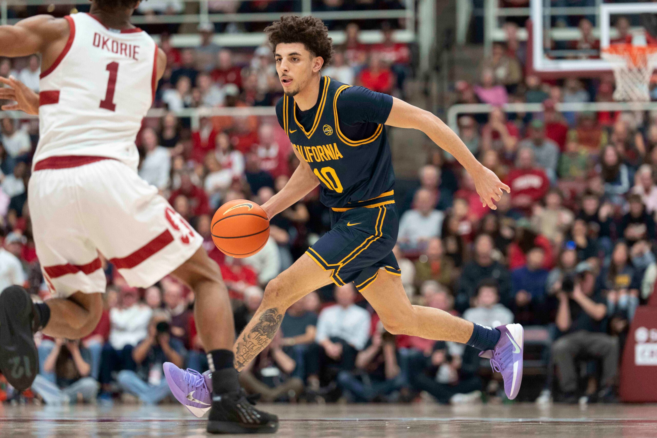 Jan 24, 2026; Stanford, California, USA;  California Golden Bears guard Justin Pippen (10) drives the ball during the second half against the Stanford Cardinal at Maples Pavilion. Mandatory Credit: Stan Szeto-Imagn Images