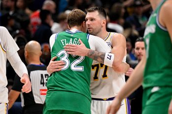 Jan 24, 2026; Dallas, Texas, USA; Dallas Mavericks forward Cooper Flagg (32) hugs Los Angeles Lakers guard Luka Doncic (77) after the game at the American Airlines Center. Mandatory Credit: Jerome Miron-Imagn Images