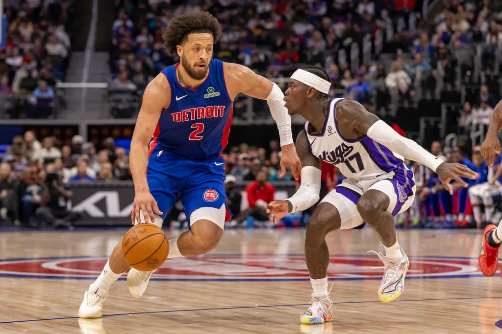 Jan 25, 2026; Detroit, Michigan, USA; Sacramento Kings guard Dennis Schroder (17) defends against Detroit Pistons guard Cade Cunningham (2) during the during the second half at Little Caesars Arena. Mandatory Credit: David Reginek-Imagn Images