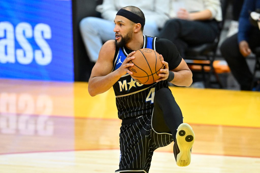 Jan 26, 2026; Cleveland, Ohio, USA; Orlando Magic guard Jalen Suggs (4) rebounds in the fourth quarter against the Cleveland Cavaliers at Rocket Arena. Mandatory Credit: David Richard-Imagn Images