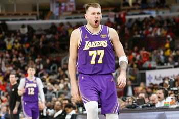 Jan 26, 2026; Chicago, Illinois, USA; Los Angeles Lakers guard Luka Doncic (77) reacts after scoring against the Chicago Bulls during the second half at United Center. Mandatory Credit: Kamil Krzaczynski-Imagn Images